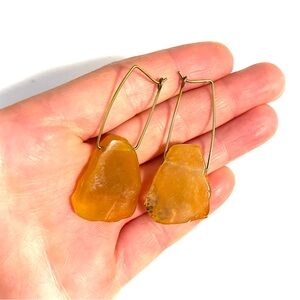 Handcrafted earrings with warm amber-hued semi-precious stone